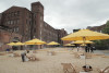 residential beach with yellow umbrellas